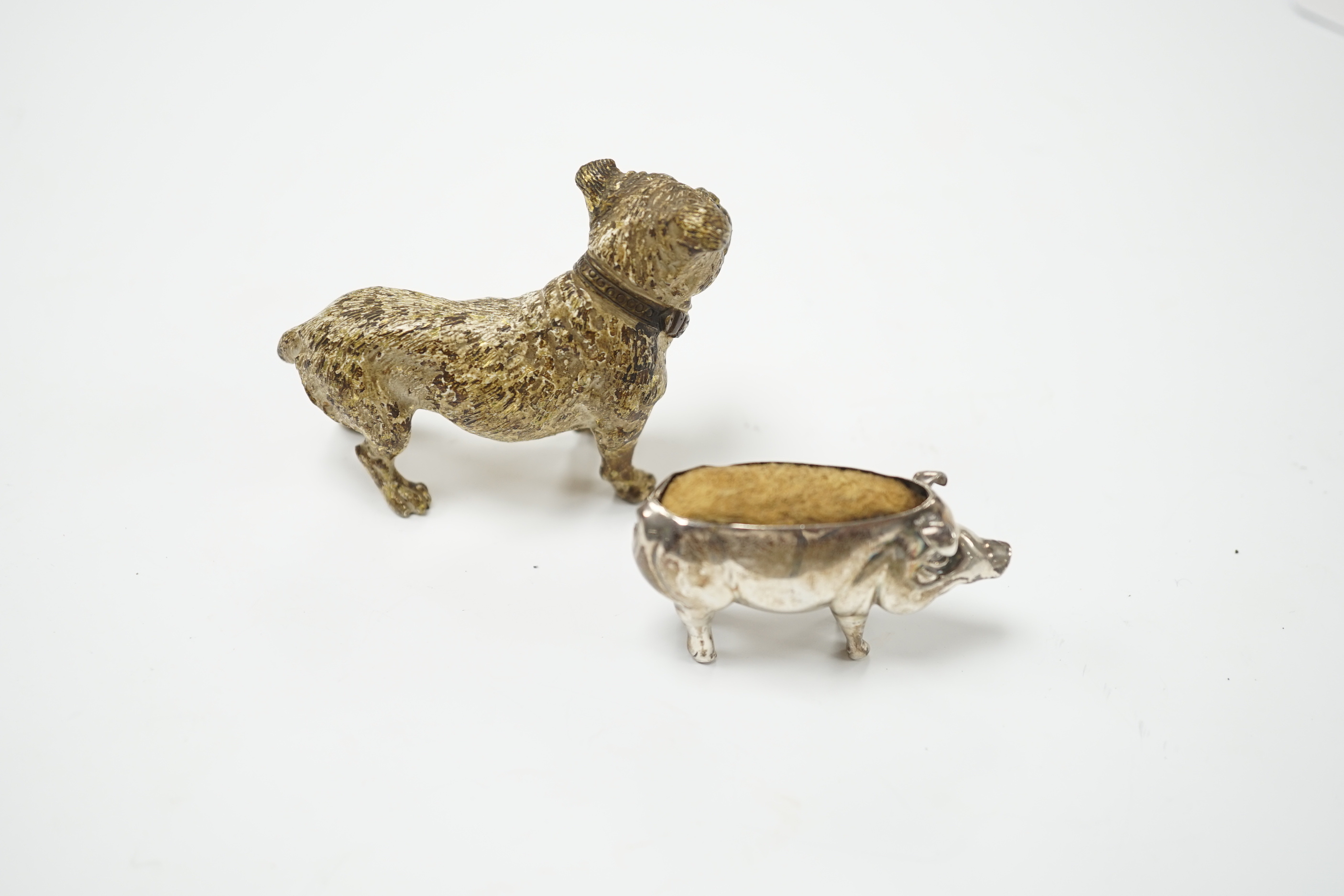 An Austrian cold painted dog, silver pig pin cushion, Adie & Lovekin, largest 6.5cm wide